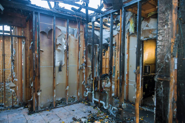 Professional Fire Damage Restoration technician working in Negaunee, MI